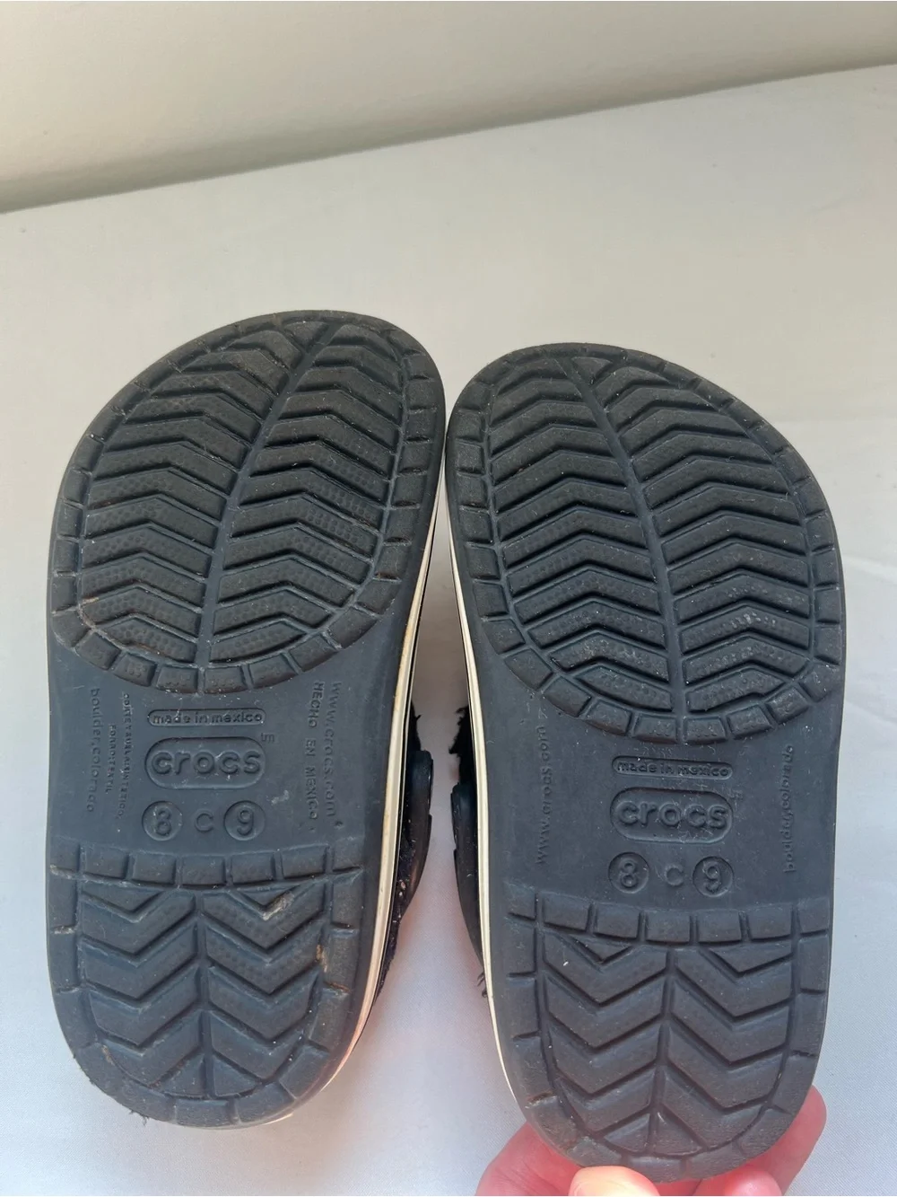 CROCS Kids Black Fleece-Lined Clogs with White Trim